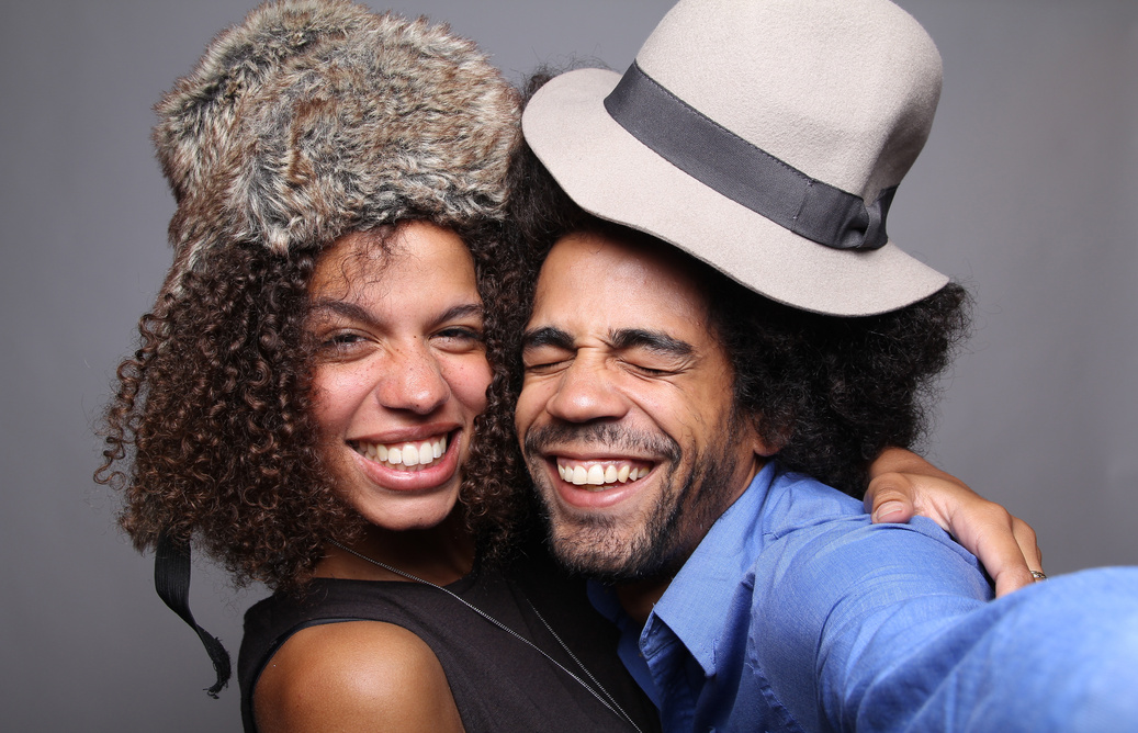 Happy love couple in a Photo Booth